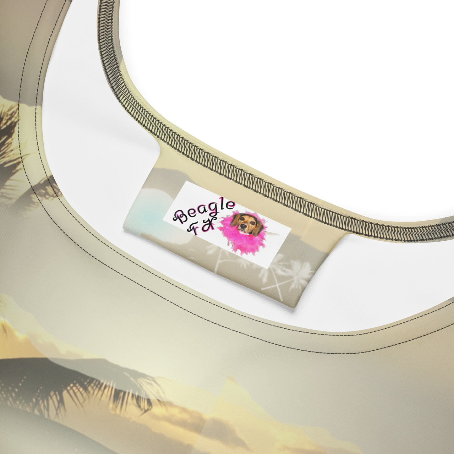 Label for Hawaiian dress from Beagle FX. Features beagle wearing pink feather boa